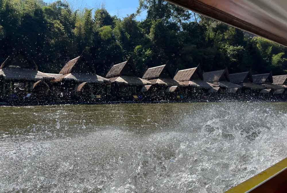 arriving at River Kwai Jungle Rafts by boat
